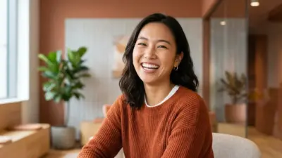 A joyful, confident woman smiling broadly, showcasing perfectly balanced teeth and healthy gums.