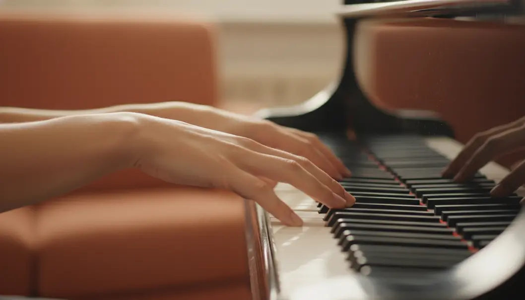 Playing legato on the piano requires slightly overlapping key presses.