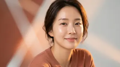 A portrait of a woman with radiant, glowing skin.