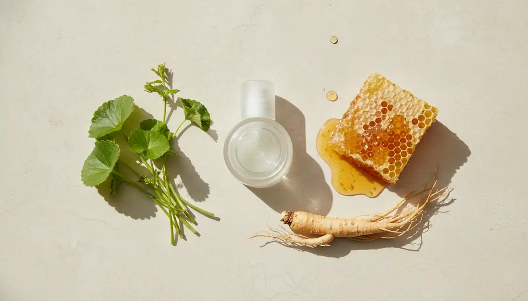 K-beauty relies on potent, nature-derived ingredients like snail mucin, cica, and propolis to heal and protect the skin.