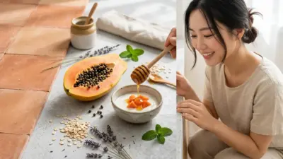 A flat lay of fresh natural peeling ingredients like papaya, yogurt, and honey on a neutral background.